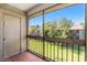 Relaxing screened patio with green lawn views at 6328 Newtown Cir # 28B3, Tampa, FL 33615