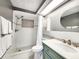 Bathroom showcasing modern sink, tiling, and shower with elegant finishes at 6718 Ranchwood Loop, New Port Richey, FL 34653