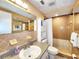 Cozy bathroom with tiled shower, vanity, and neutral tones at 6718 Ranchwood Loop, New Port Richey, FL 34653
