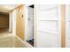 Hallway features built-in shelving and access to other areas of the home at 6718 Ranchwood Loop, New Port Richey, FL 34653
