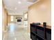 Bright living area with tile flooring and fireplace, perfect for entertaining and relaxation at 6718 Ranchwood Loop, New Port Richey, FL 34653