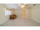 Open-concept living room with a ceiling fan and tile flooring at 702 W Brockton Pl # 2, Sun City Center, FL 33573