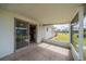 Screened patio, with a sliding glass door to the eat-in kitchen, provides an outdoor space at 702 W Brockton Pl # 2, Sun City Center, FL 33573