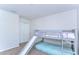 Bedroom features a bunk bed with a slide, carpeted floors, and closet at 11117 Abaco Island Ave, Riverview, FL 33579