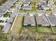 Aerial view of homes showing expansive lawns, well-manicured landscaping, and neighborhood streets at 11501 Cedar Valley Dr, Riverview, FL 33569