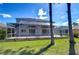 Spacious backyard with screened-in patio, ideal for outdoor living and entertaining at 18126 Kara Ct, Tampa, FL 33647