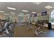 Well-equipped gym with modern cardio machines, weights, and mirrored wall at 18126 Kara Ct, Tampa, FL 33647