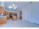 Eat-in kitchen with stainless appliances, tile floors, and wood cabinets at 18126 Kara Ct, Tampa, FL 33647