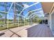 Screened patio overlooking golf course and lush green lawn at 18126 Kara Ct, Tampa, FL 33647