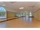 Spacious studio with wood floor and wall mirrors, ideal for dance, fitness, or creative pursuits at 18126 Kara Ct, Tampa, FL 33647