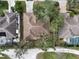 This aerial view showcases the home's layout, large lot, and proximity to neighborhood amenities at 1875 Oak Branch Dr, Sarasota, FL 34232
