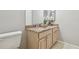 Comfortable bathroom with a toilet, vanity, granite countertops, and good lighting at 1902 Sweet Bay Ct, Plant City, FL 33566