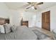The bedroom has a ceiling fan and a closet at 1902 Sweet Bay Ct, Plant City, FL 33566
