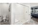 Bright bathroom with a glass-enclosed shower, modern fixtures, and a convenient layout at 20237 Bandera Pl, Venice, FL 34293
