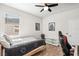 Cozy bedroom featuring a sleek single bed, modern decor, and a well-lit ambiance at 20237 Bandera Pl, Venice, FL 34293