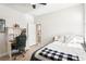 Cozy bedroom featuring light wood floors and ample natural light at 20237 Bandera Pl, Venice, FL 34293