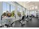 Community gym with stationary bikes and large windows at 20237 Bandera Pl, Venice, FL 34293