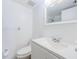 Clean bathroom with a sink, toilet, and shower at 256 Cypress Ln # 120, Oldsmar, FL 34677