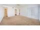 Spacious bedroom with closet, ceiling fan, and a sliding glass door to the screened patio at 256 Cypress Ln # 120, Oldsmar, FL 34677