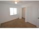 Cozy bedroom with closet and large window providing ample natural light at 256 Cypress Ln # 120, Oldsmar, FL 34677