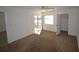 Cozy bedroom with a window view, ceiling fan, and closet for organized storage at 256 Cypress Ln # 120, Oldsmar, FL 34677