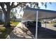Carport parking with shaded cover protects vehicles from the elements at 256 Cypress Ln # 120, Oldsmar, FL 34677