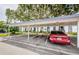 Assigned carport parking in front of building at 256 Cypress Ln # 120, Oldsmar, FL 34677