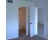 View of the hallway featuring the closet, and hardwood floors at 256 Cypress Ln # 120, Oldsmar, FL 34677