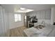 Bright kitchen with stainless appliances and a sunny window at 256 Cypress Ln # 120, Oldsmar, FL 34677