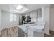 Modern kitchen with stainless steel appliances, and ample counter space at 256 Cypress Ln # 120, Oldsmar, FL 34677