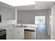 Bright kitchen featuring stainless steel appliances and open floor plan at 256 Cypress Ln # 120, Oldsmar, FL 34677