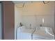 Bright laundry area featuring a washing machine and dryer at 256 Cypress Ln # 120, Oldsmar, FL 34677