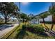 Sign for Cypress Estates One community with tropical landscaping at 256 Cypress Ln # 120, Oldsmar, FL 34677