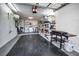Spacious garage equipped with laundry facilities, storage shelves, and a utility sink at 2731 Sherbrooke Ln # D, Palm Harbor, FL 34684