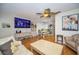 Spacious living room boasts hardwood floors and ample seating arrangement at 2731 Sherbrooke Ln # D, Palm Harbor, FL 34684