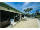 Community pool and patio area perfect for relaxing and entertaining at 2731 Sherbrooke Ln # D, Palm Harbor, FL 34684