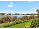 Lakeside backyard offering a picturesque view at 3226 Nautical S Pl, St Petersburg, FL 33712