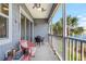 Charming balcony with seating area, perfect for enjoying the serene waterfront view at 3226 Nautical S Pl, St Petersburg, FL 33712