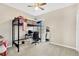 Functional bedroom with a loft bed, desk area, and ample space, ideal for studying and sleeping at 4071 Balcony Breeze Dr, Land O Lakes, FL 34638