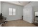 A guest bedroom features a murphy bed, closet, and desk for flexible living at 4946 Sapphire Sound Dr, Wimauma, FL 33598
