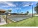 Bocce ball courts with shade trees and seating areas at 4946 Sapphire Sound Dr, Wimauma, FL 33598