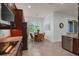 Eat-in kitchen with large windows and cozy breakfast table with seating at 4946 Sapphire Sound Dr, Wimauma, FL 33598