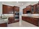 Well-equipped kitchen showcases granite countertops, stainless steel appliances, and ample storage at 4946 Sapphire Sound Dr, Wimauma, FL 33598