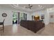 Open living room with tile flooring, recessed lighting, and an expansive view of the backyard at 4946 Sapphire Sound Dr, Wimauma, FL 33598