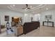 Inviting living room with neutral walls, tile floors, recessed lighting, and an open layout at 4946 Sapphire Sound Dr, Wimauma, FL 33598