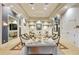 Stylish lobby with comfortable seating, modern decor and elegant lighting at 4946 Sapphire Sound Dr, Wimauma, FL 33598