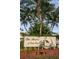 Beautiful community sign surrounded by lush greenery and mature palm trees at 6315 Shoreline Dr # 3305, Madeira Beach, FL 33708