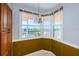Bright dining area with a chandelier, offering scenic views and natural light at 6315 Shoreline Dr # 3305, Madeira Beach, FL 33708