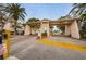 Welcoming community entrance gate for residents and guests with manicured landscaping at 6315 Shoreline Dr # 3305, Madeira Beach, FL 33708