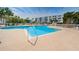 Refreshing community pool with a brick deck and resort-style seating at 6315 Shoreline Dr # 3305, Madeira Beach, FL 33708